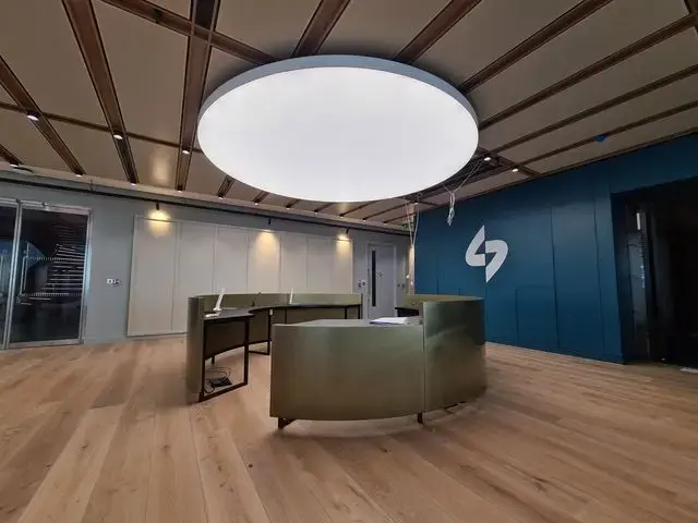 4 meters diameter circle light over the reception in London office