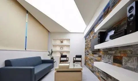 Backlit flush-mount light panels installed in a private client waiting room