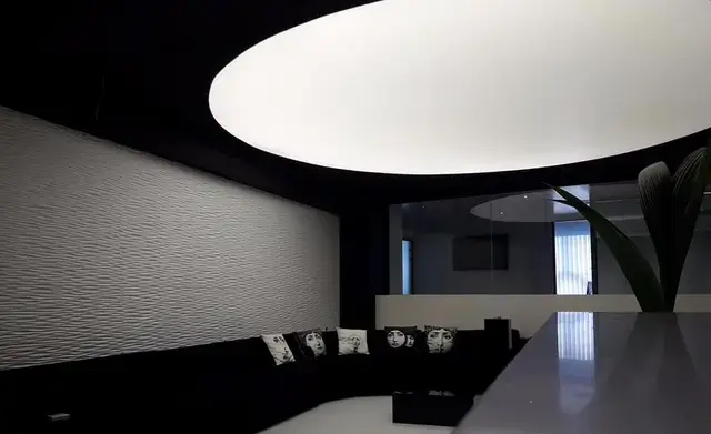 Large circle light over reception in private cosmetic surgery clinic