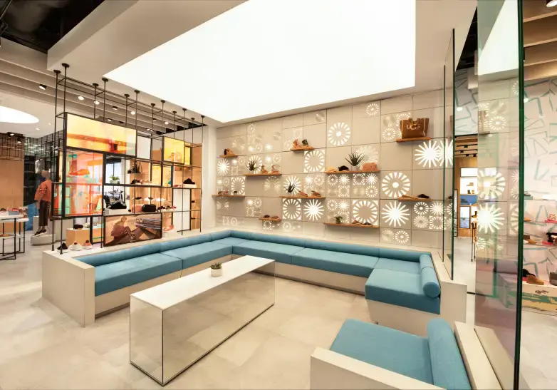 Large illuminated light panels installed in a well-known shoe shop